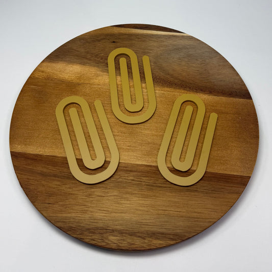 Acrylic overrsized paperclip.