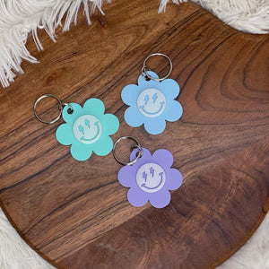 Lightening Bolt Eyes - Smiley Face Daisy Keychain